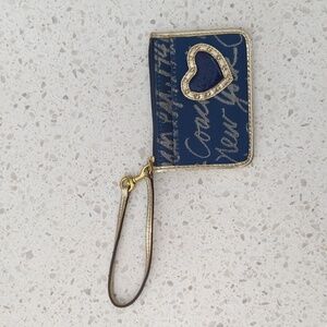 Coach New York wristlet in navy blue and metallic gold